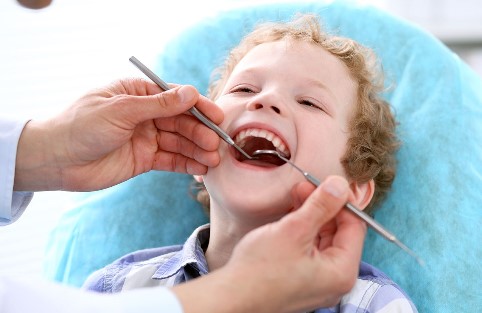 удаление зубов у детей фото